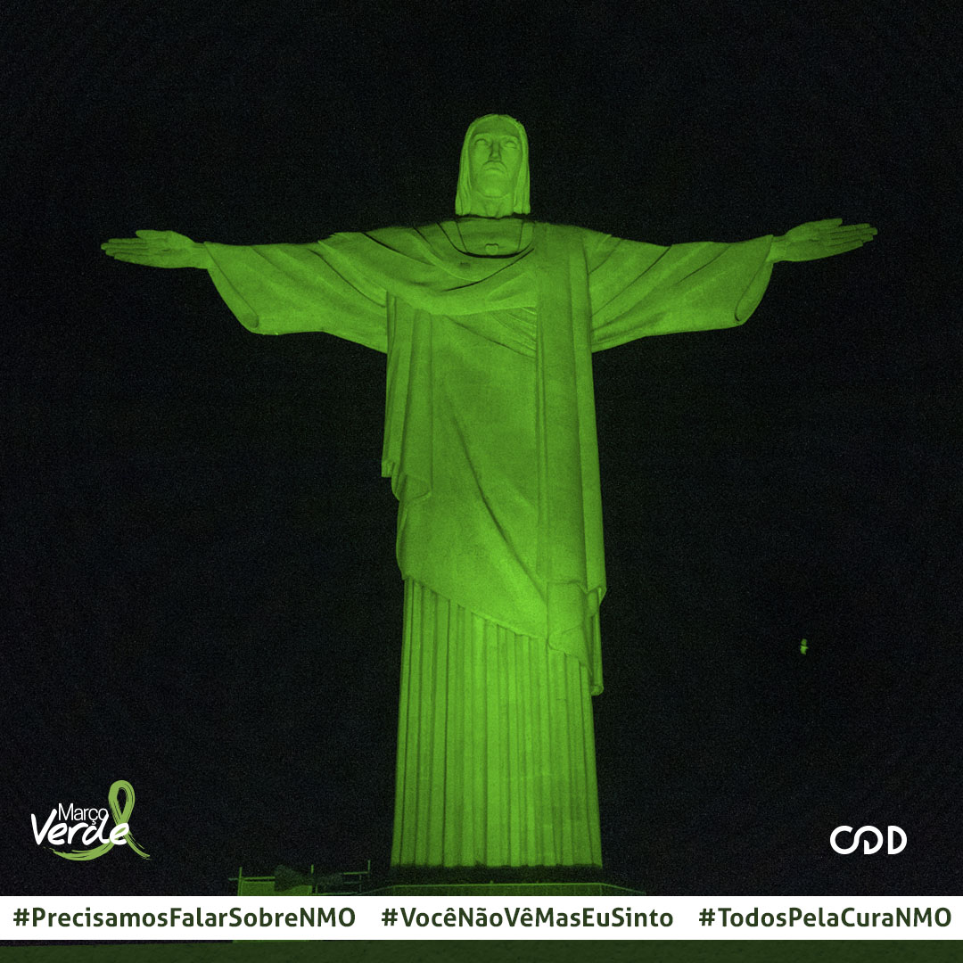 Cristo Redentor é iluminado de verde em ação da AME-CDD para Dia Nacional de Conscientização de NMO